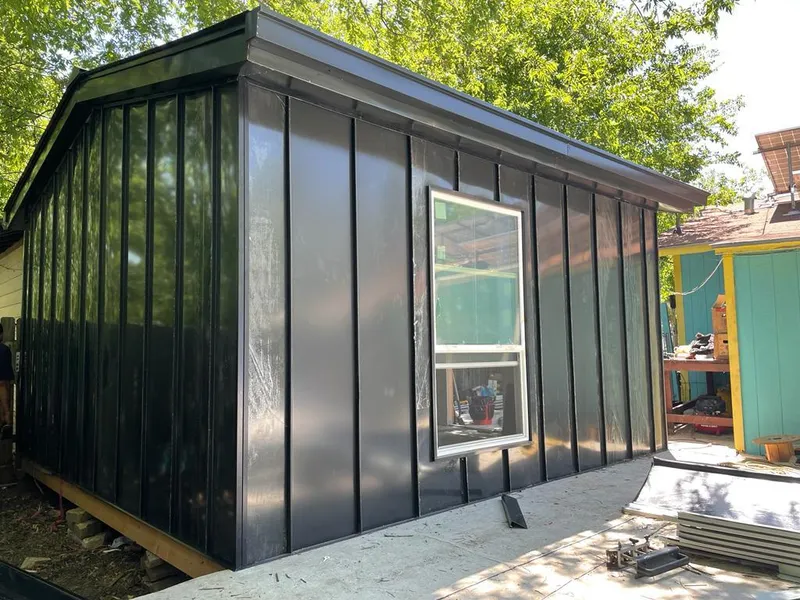 Black standing seam metal wall panels for Roof Inspection in Guthrie