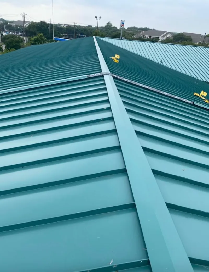 Green commercial metal roof ridge and valley for Metal Roof Repair in Guthrie