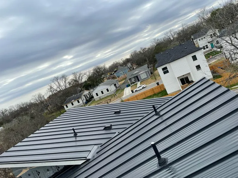 Standing seam metal roof panels with vents for Skylight Repair in Guthrie
